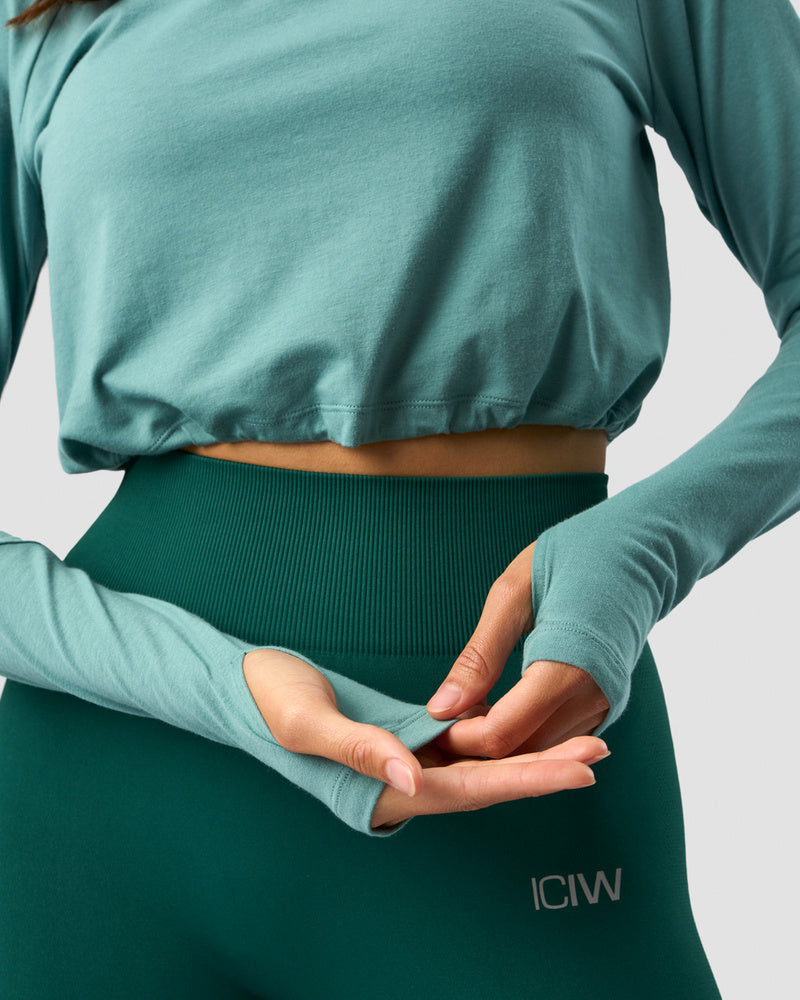 define cropped 1/4 zip adjustable mineral green