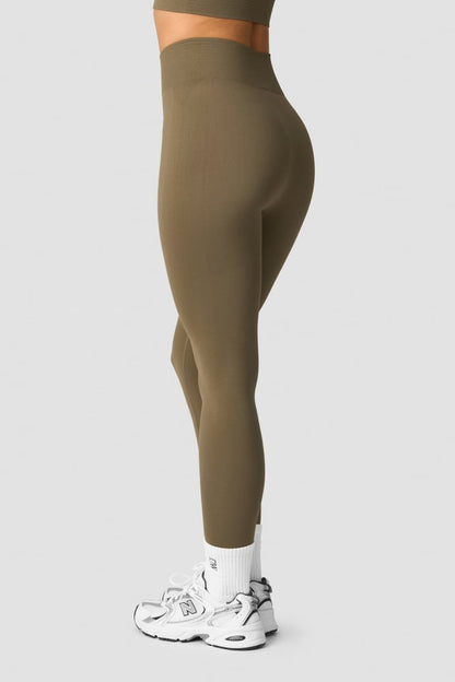 define seamless tights dark sand