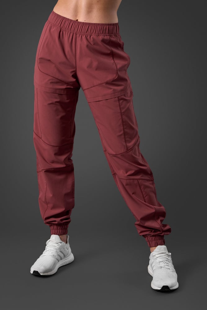 reboot pants brick red