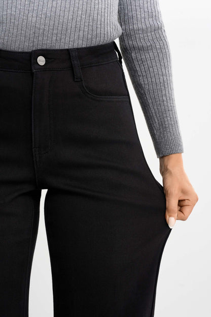 Värmande pösiga jeans
